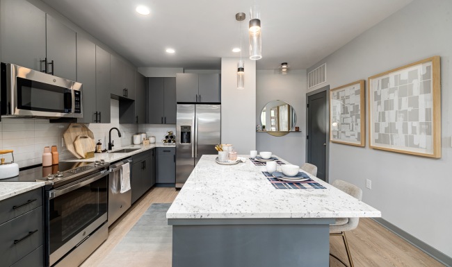 spacious kitchen with stainless steel appliances 