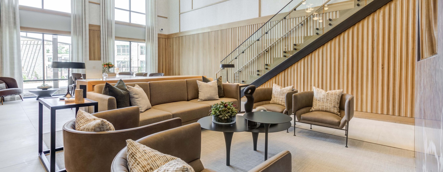 clubroom with ample seating and large windows